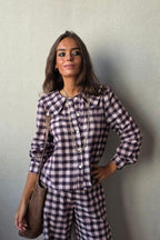 Camisa animal print con brillos berenjena