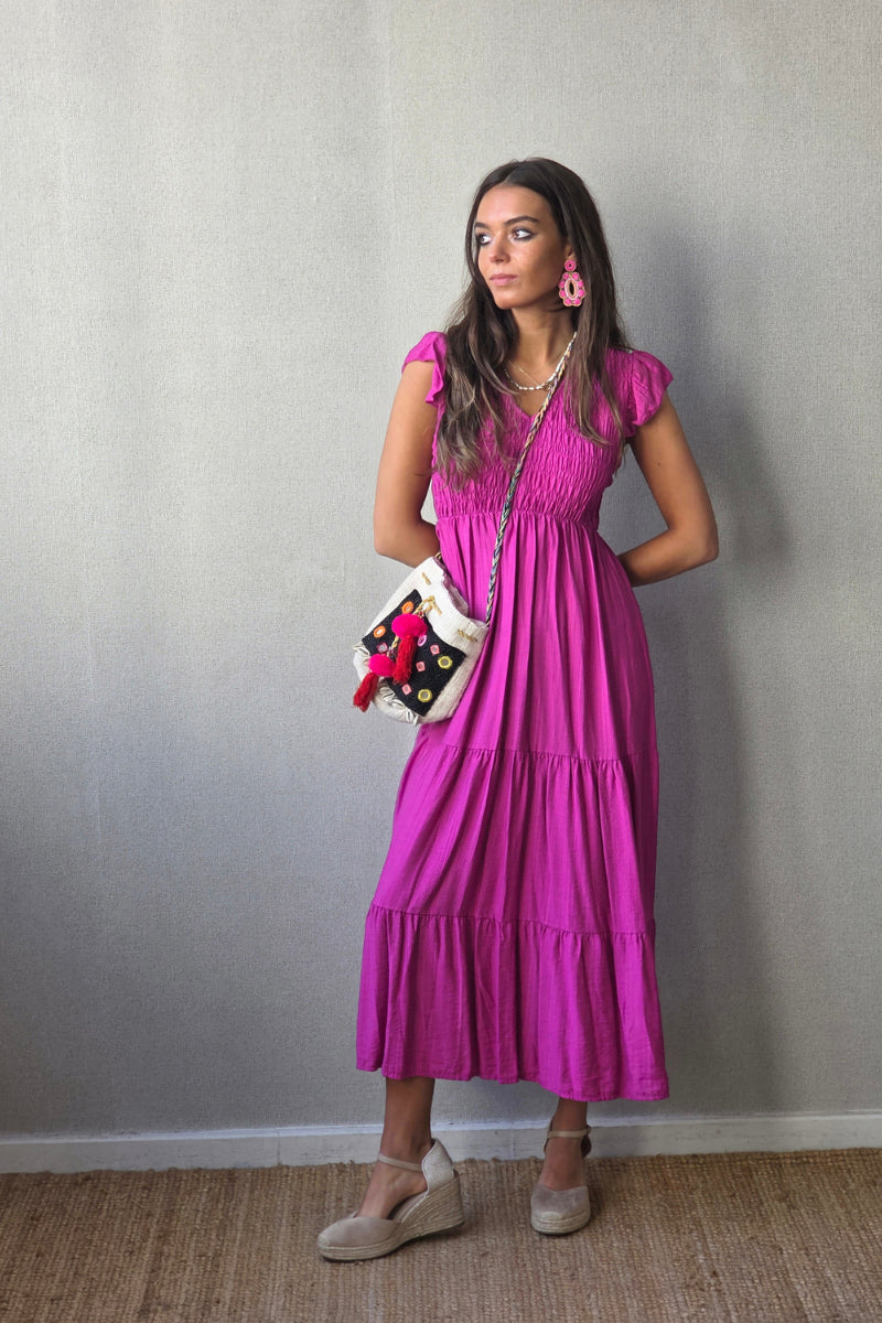 Vestido nido de abeja con volantes magenta