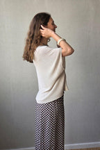 Jersey tipo capa manga calada beige