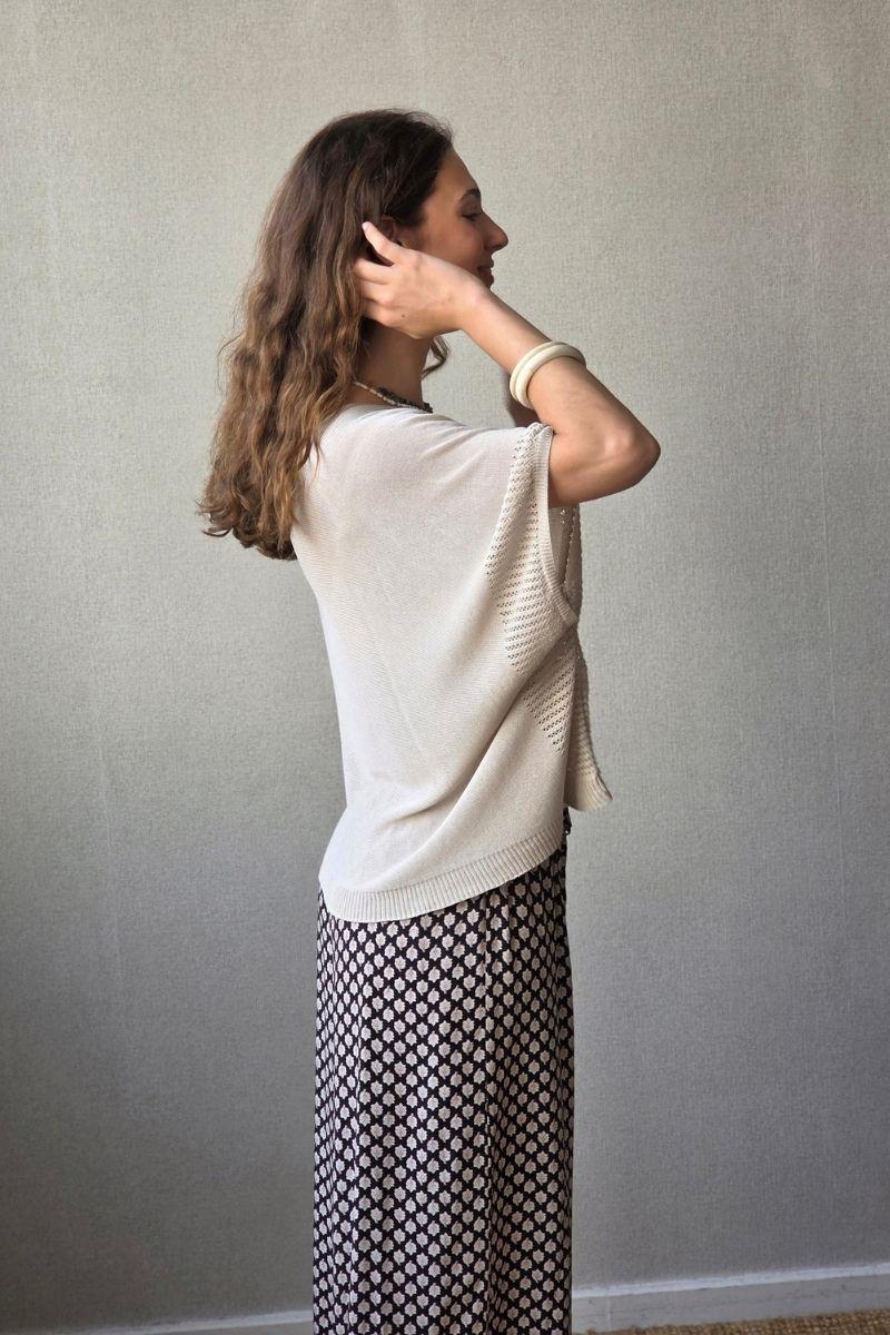 Jersey tipo capa manga calada beige