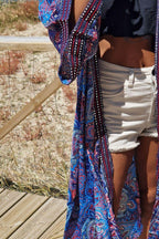 Kimono largo estampado rematado con espejitos tonos azulones