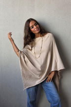 Capa de punto beige
