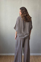 Blusón oversize estampado de flores negro