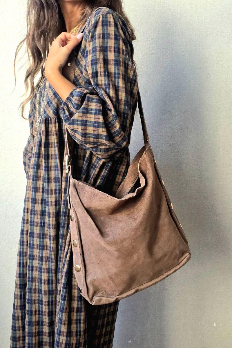Boslo topo oversize con detalles dorados