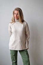 Jersey oversize beige de cuello alto