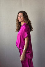 Falda de raso magenta