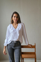 Blusa romántica con volantes blanca
