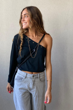 Top asimétrico con estrellas negro