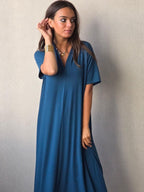 Vestido liso cuello pico m/corta petróleo