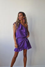 Mini falda con lazada delantera en color morado
