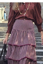 Falda de rayas volantes teja