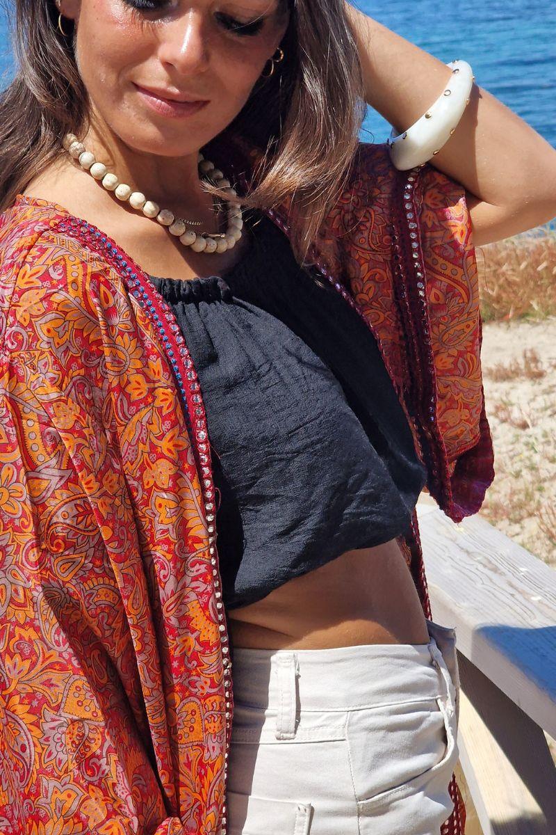 Kimono largo estampado rematado con espejitos tonos naranja