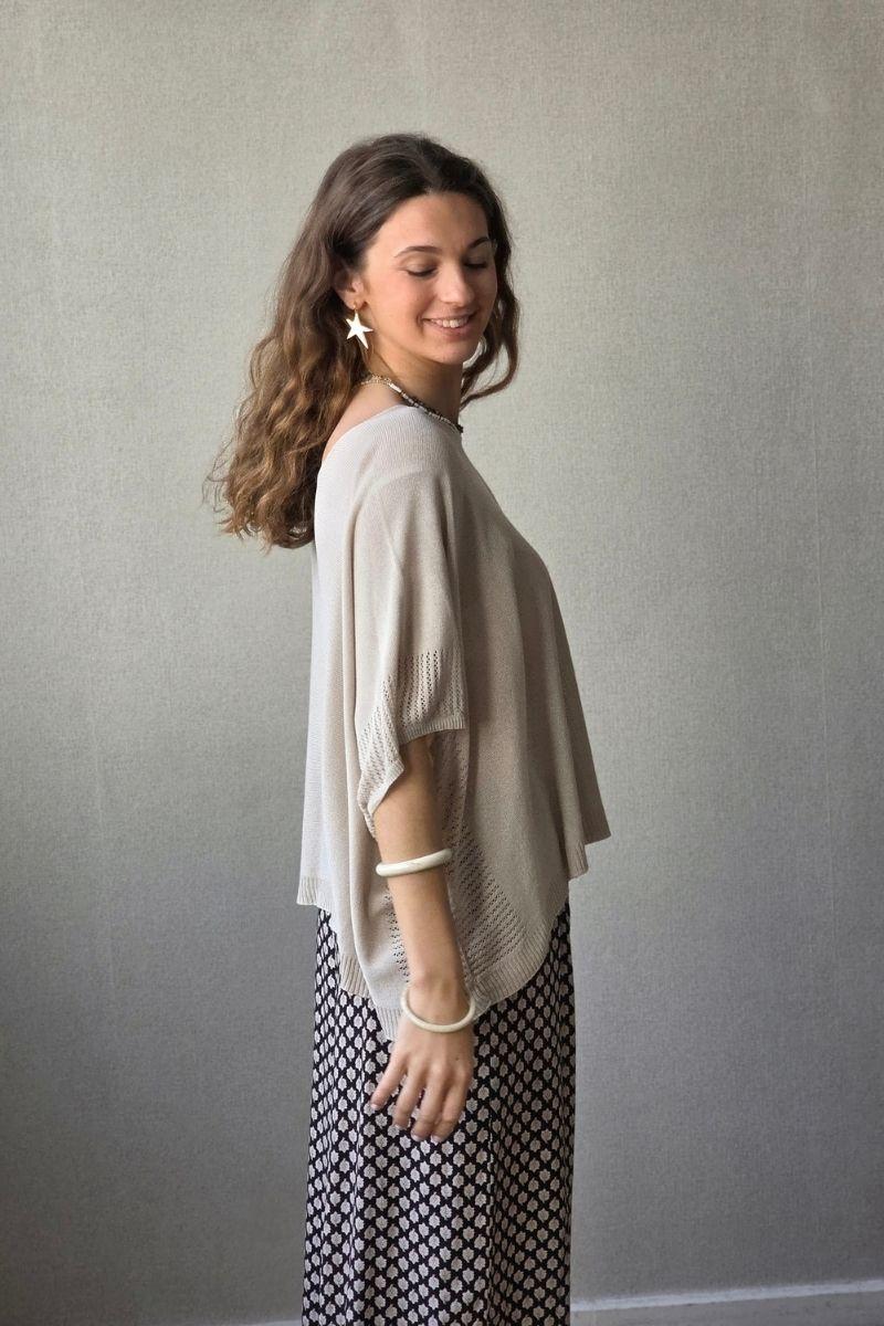 Jersey tipo capa manga calada beige
