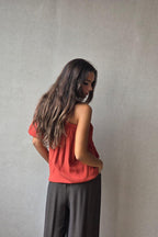 Blusa goma caldero asimétrica