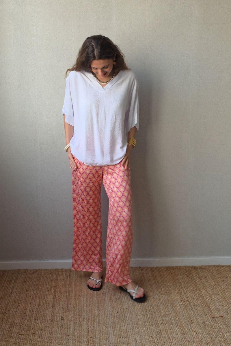 Pantalón estampado fuego bolsillos naranja