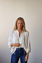 Blusa con botones blanco roto