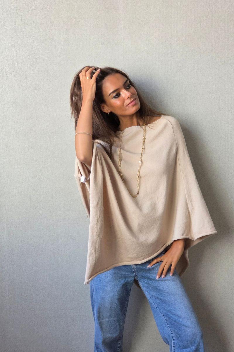 Capa de punto beige