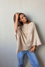 Capa de punto beige