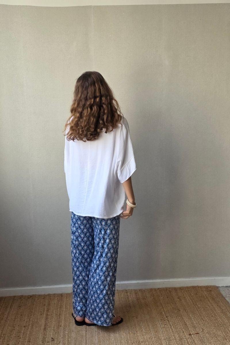 Pantalón estampado fuego azul jeans