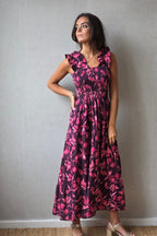 Vestido con flores fruncido fucsia