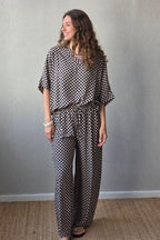 Blusón oversize estampado de flores negro