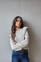 Jersey con volante beige