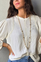 Blusa tira borda beige