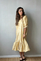 Vestido flores con botones amarillo