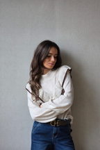 Jersey con volante beige