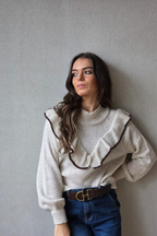 Jersey con volante beige