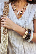 Bolso rafía en color natural y dorado