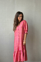 Vestido flores con botones fucsia
