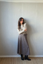 Falda British de cuadros con cinturón beige