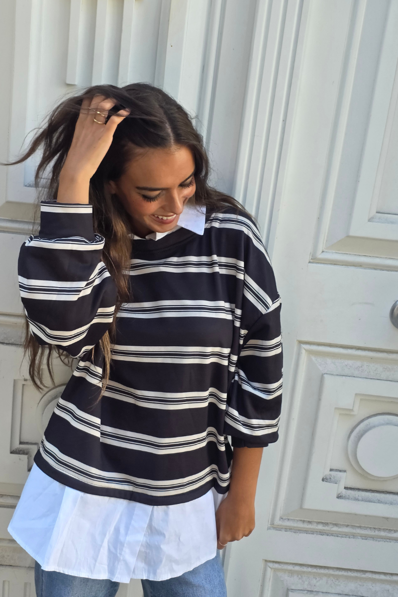 Jersey de rayas negras y blancas con detalle de camisa falsa
