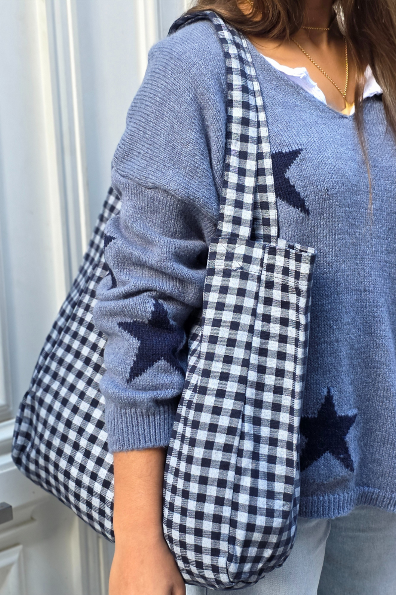 Jersey punto cuello pico con estrellas azul