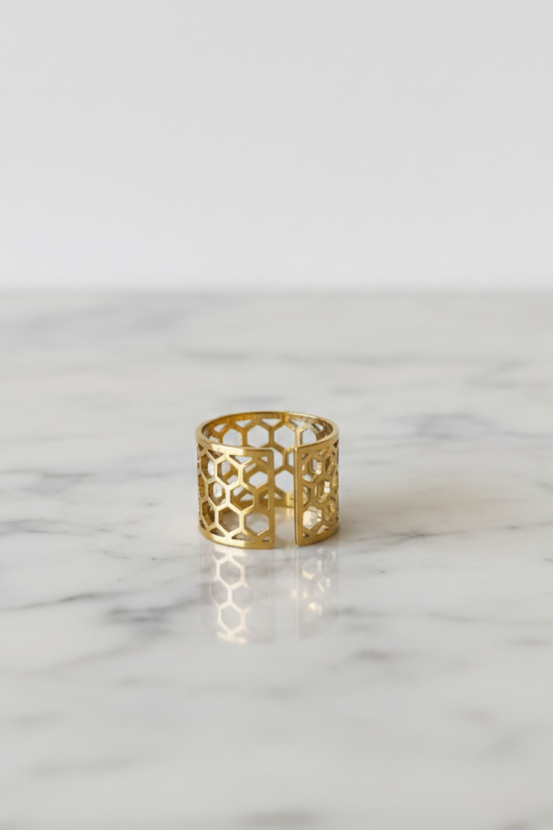 Anillo ajustable calado de acero dorado