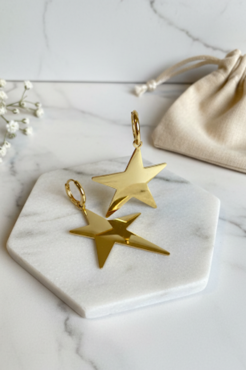 Pendientes acero estrella dorado mediano