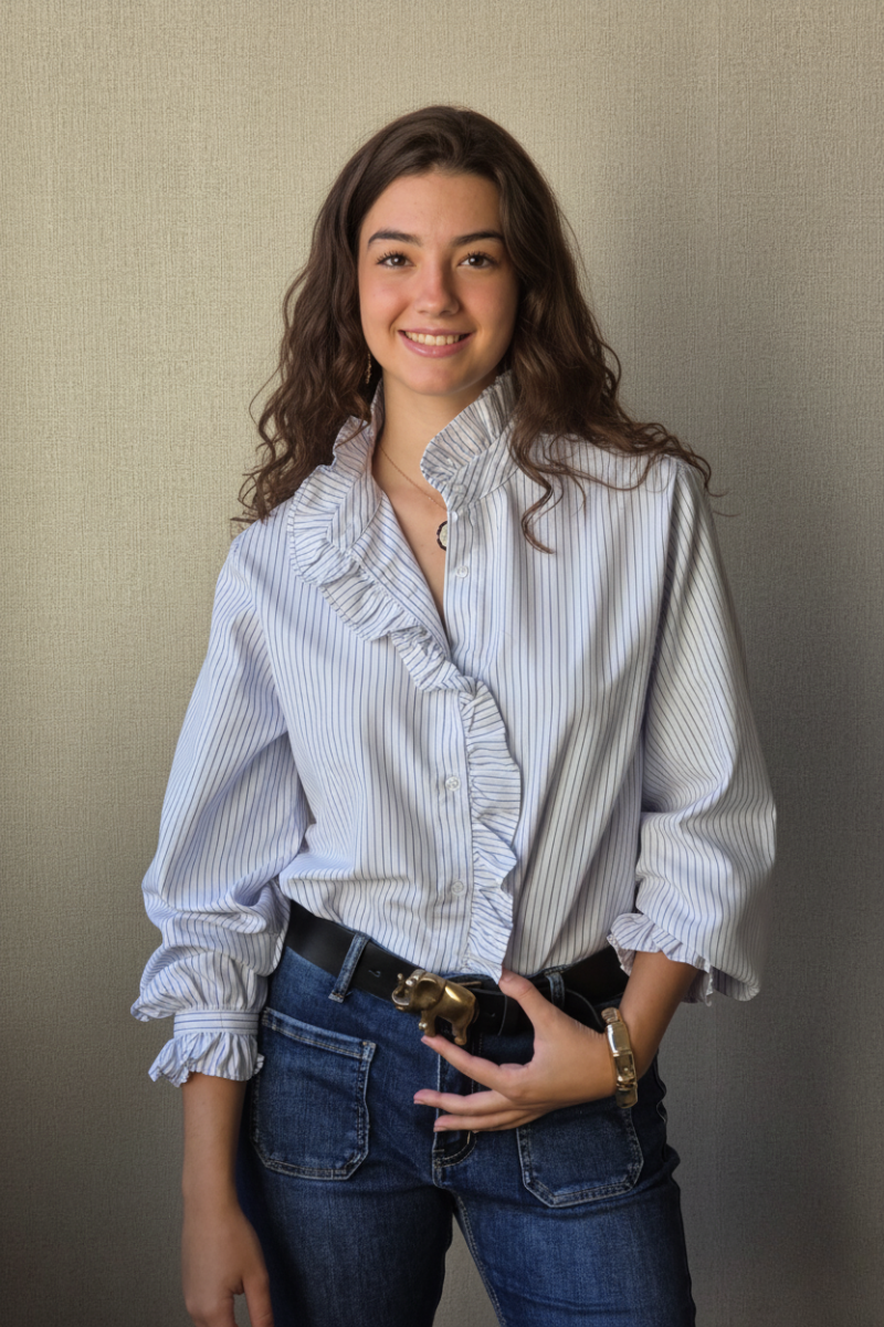 Blusa de rayas con volante blanca