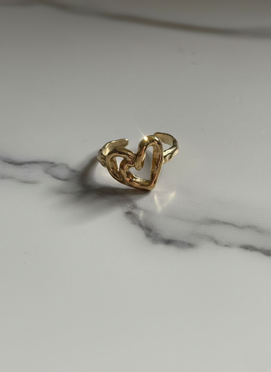 Anillo ajustable de corazón acero dorado