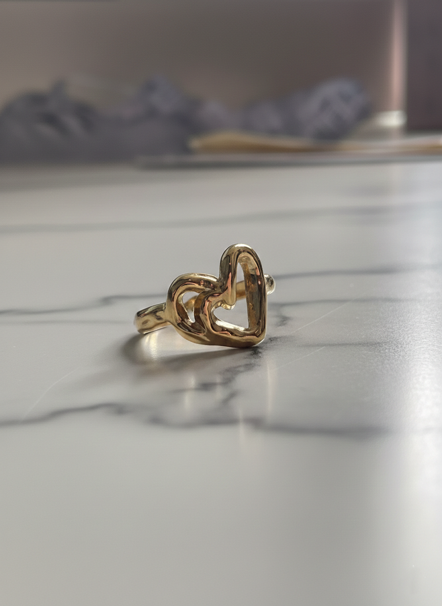 Anillo ajustable de corazón acero dorado