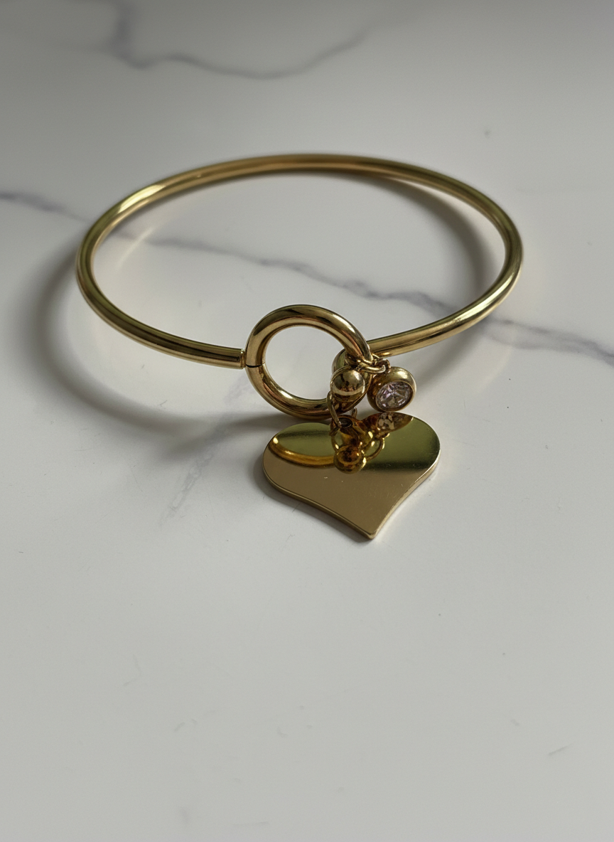 Pulsera de acero dorada de corazón