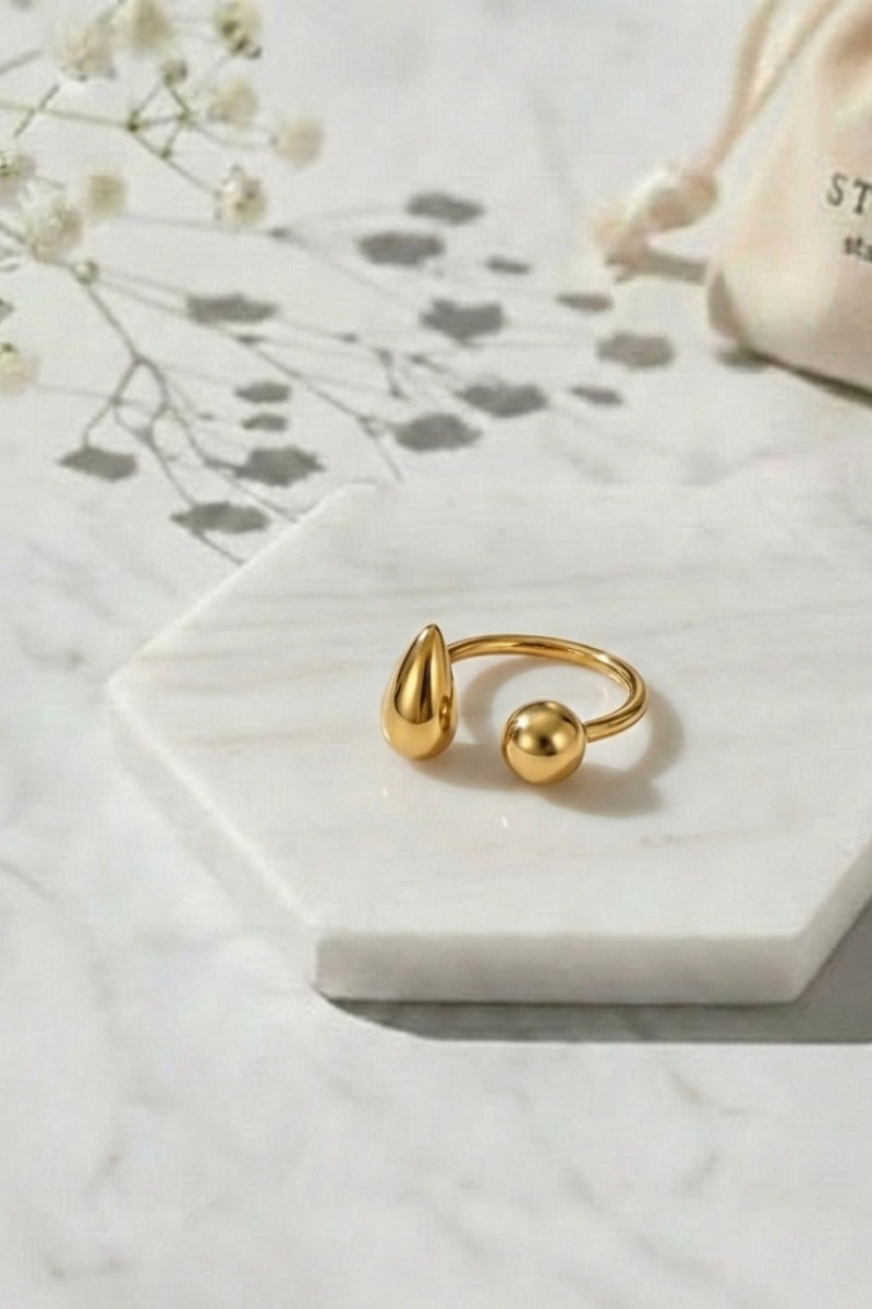 Anillo Ajustable estilo gota acero dorado