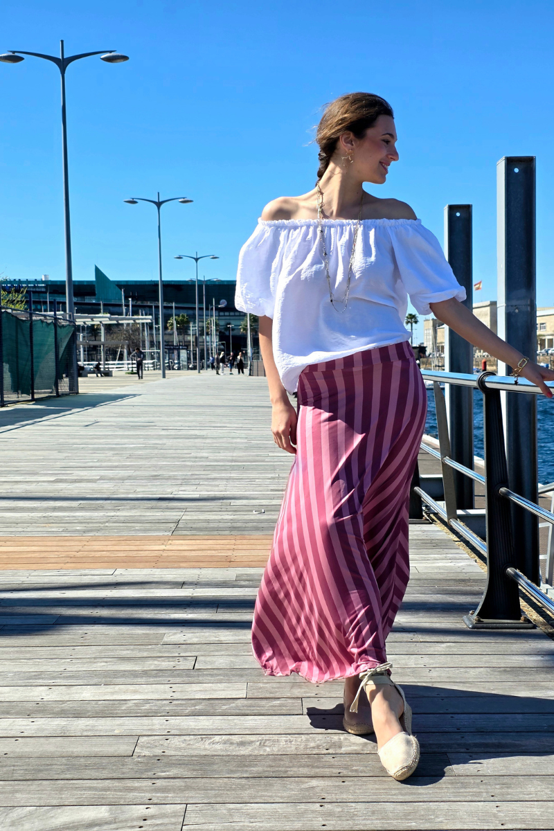 Falda larga de rayas fucsia. Tejido que no se arruga, vibrante y femenina. Perfecta para cualquier ocasión. Descúbrela en Liberatta.