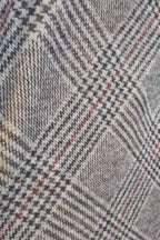 Falda British de cuadros con cinturón beige